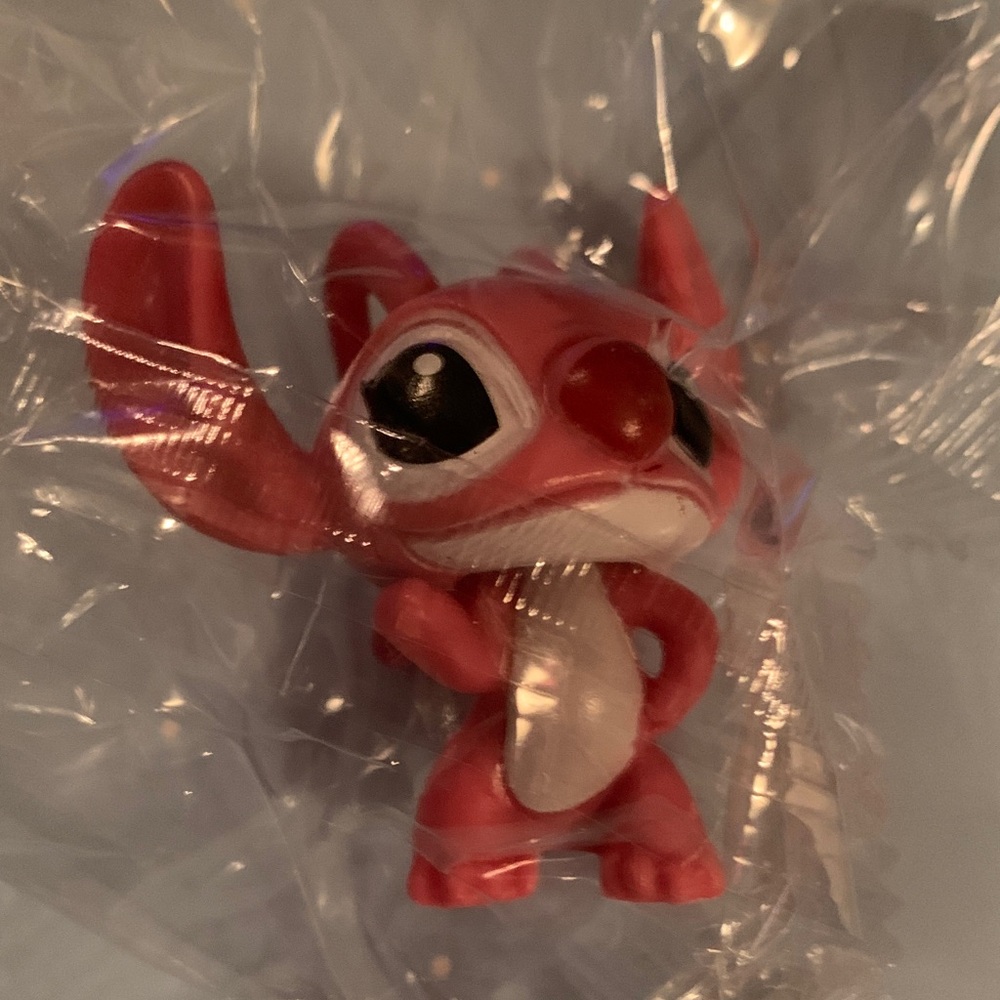 Adorable Red Creature Action Figure
Set of 3 2 Stitch and one Angel